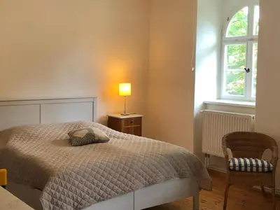 Ein Bett oder Betten in einem Zimmer der Unterkunft Schönewalde Appartement 2