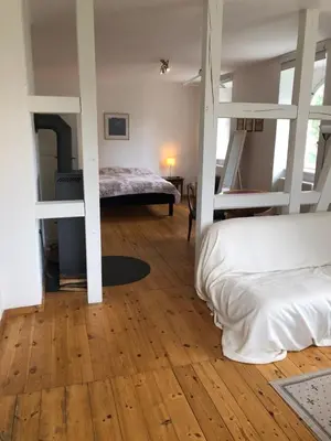 Ein Bett oder Betten in einem Zimmer der Unterkunft Schönewalde Appartement 2