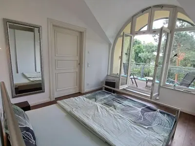 Ein Bett oder Betten in einem Zimmer der Unterkunft Havelpalais Comfortable holiday residence
