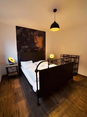 Ein Bett oder Betten in einem Zimmer der Unterkunft Charming Apartments am See