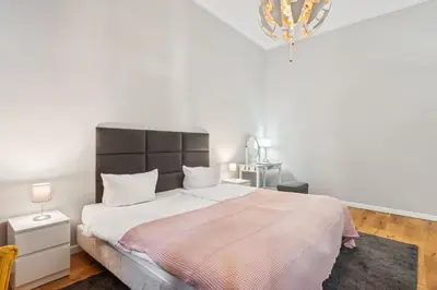 Ein Bett oder Betten in einem Zimmer der Unterkunft Center Apartments in PrenzlauerBerg