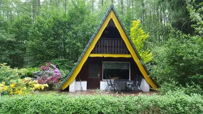 Ein Garten an der Unterkunft gemütliches Waldhaus