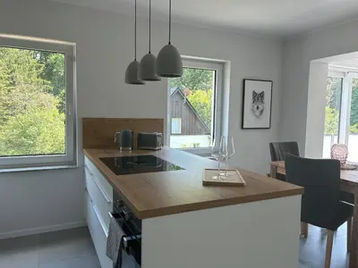 Küche/Küchenzeile in der Unterkunft Ferienwohnung Waldesruh mit Kaminofen und Balkon