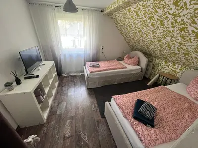 Ein Bett oder Betten in einem Zimmer der Unterkunft Apartment DAHL 3 Zimmer
