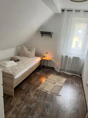 Ein Bett oder Betten in einem Zimmer der Unterkunft Apartment DAHL 3 Zimmer