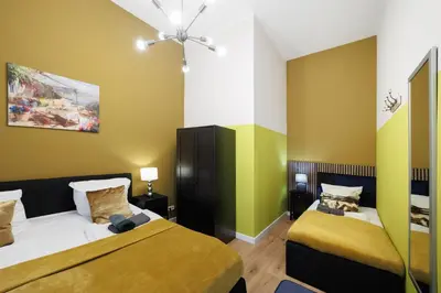 Ein Bett oder Betten in einem Zimmer der Unterkunft Stylish 4Rooms Flat am Adenauerplatz 8 Personen Kurfürstendamm