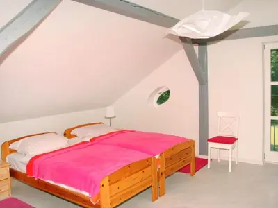 Ein Bett oder Betten in einem Zimmer der Unterkunft von Stechow Comfortable holiday residence