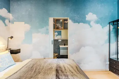 Ein Bett oder Betten in einem Zimmer der Unterkunft Heavenly flat in Berlin self check in