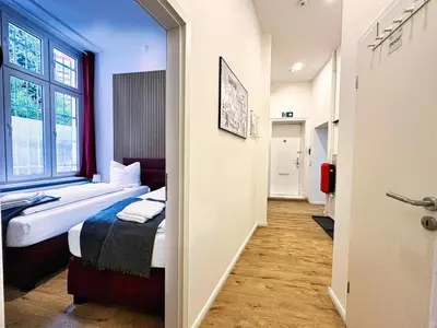 Ein Bett oder Betten in einem Zimmer der Unterkunft fairAPART 5 rooms, 2 baths, 120sq m Prenzlauer Berg