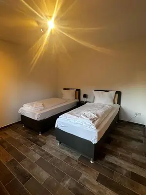 Ein Bett oder Betten in einem Zimmer der Unterkunft 2-Zimmer Wohnung, Parkplatz und Terrasse, Nah A10 und Berlin