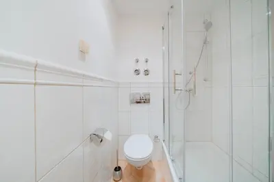 Ein Badezimmer in der Unterkunft Parklounge Apartment in historic Villa