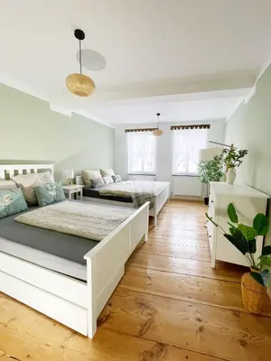 Ein Bett oder Betten in einem Zimmer der Unterkunft Stadtnah & Naturverbunden