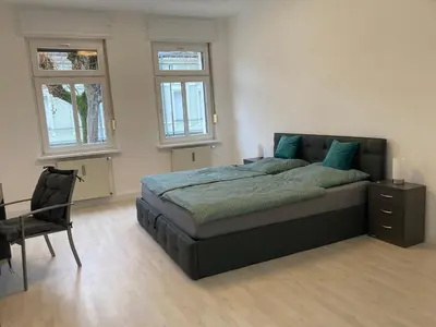 Ein Bett oder Betten in einem Zimmer der Unterkunft 2-Zimmer-Ferienwohnung 55 qm, bei Berlin