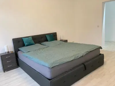 Ein Bett oder Betten in einem Zimmer der Unterkunft 2-Zimmer-Ferienwohnung 55 qm, bei Berlin