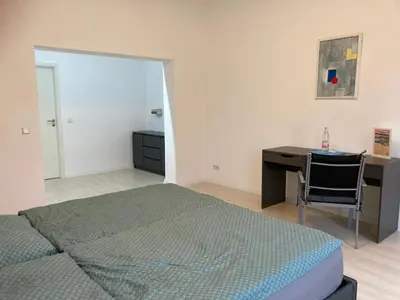 Ein Bett oder Betten in einem Zimmer der Unterkunft 2-Zimmer-Ferienwohnung 55 qm, bei Berlin