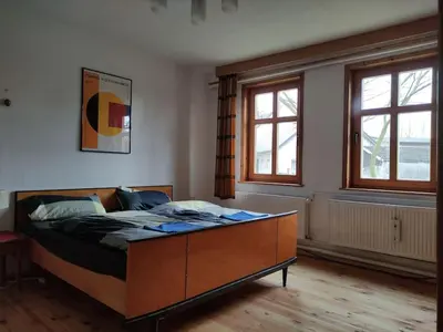 Ein Bett oder Betten in einem Zimmer der Unterkunft Historisches Bauernhaus