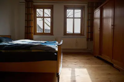 Ein Bett oder Betten in einem Zimmer der Unterkunft Historisches Bauernhaus