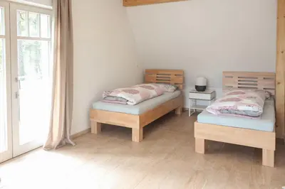 Ein Bett oder Betten in einem Zimmer der Unterkunft Villa Liselotte