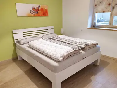 Ein Bett oder Betten in einem Zimmer der Unterkunft Villa Liselotte