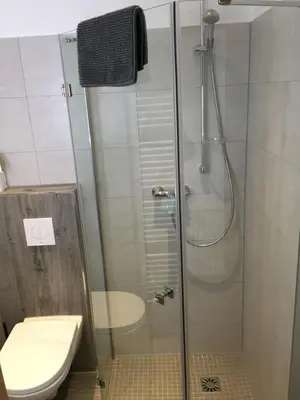 Ein Badezimmer in der Unterkunft Pension am Helios