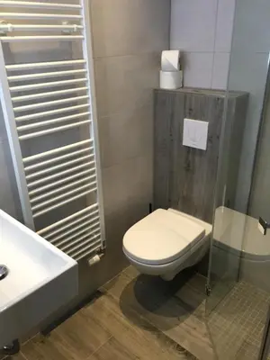 Ein Badezimmer in der Unterkunft Pension am Helios