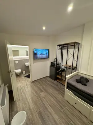 Ein Badezimmer in der Unterkunft Pension am Helios