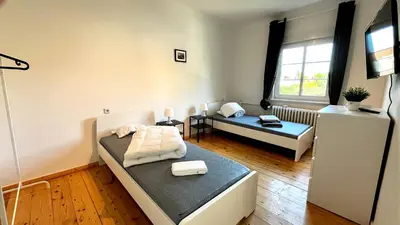 Ein Bett oder Betten in einem Zimmer der Unterkunft Work & Stay- vollausgestattet mit Garten & Parkplatz
