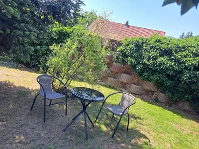 Ein Garten an der Unterkunft Dixiland