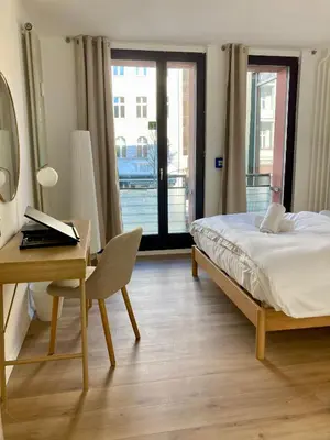 Ein Bett oder Betten in einem Zimmer der Unterkunft Minimal Hostel Kreuzberg
