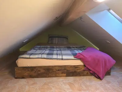 Ein Bett oder Betten in einem Zimmer der Unterkunft NEU! Ferienwohnung Havel-Biene