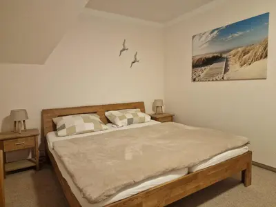 Ein Bett oder Betten in einem Zimmer der Unterkunft Gasthaus Fontane GmbH
