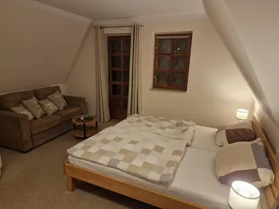 Ein Bett oder Betten in einem Zimmer der Unterkunft Gasthaus Fontane GmbH