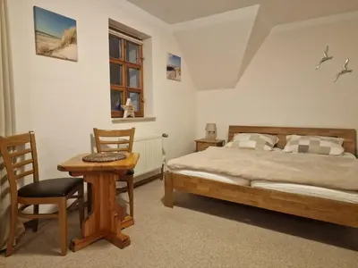 Ein Bett oder Betten in einem Zimmer der Unterkunft Gasthaus Fontane GmbH