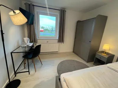 Ein Bett oder Betten in einem Zimmer der Unterkunft Truckcenter Fehrbellin an der A24