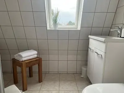 Ein Badezimmer in der Unterkunft Truckcenter Fehrbellin an der A24