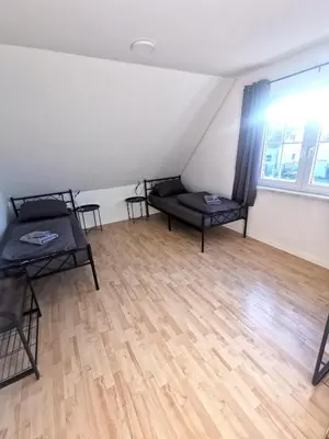 Ein Sitzbereich in der Unterkunft Monteur-Haus Klettenberg Berlin Treptow, Altglienicke, Neukölln