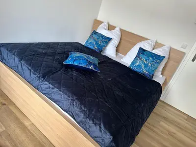 Ein Bett oder Betten in einem Zimmer der Unterkunft NicePlace4You