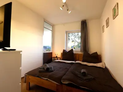 TV/Unterhaltungsangebot in der Unterkunft Modern Apartment Near Kristalltherme- MontiRooms