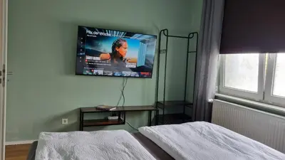 Ein Bett oder Betten in einem Zimmer der Unterkunft Design Apartment, Klimaanlage, Parkplatz, Netflix & Disney, Dominos Pizza, Wallbox