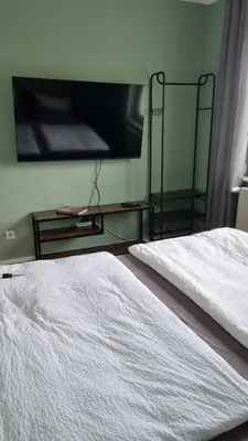 Ein Bett oder Betten in einem Zimmer der Unterkunft Design Apartment, Klimaanlage, Parkplatz, Netflix & Disney, Dominos Pizza, Wallbox