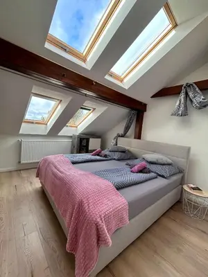 Ein Bett oder Betten in einem Zimmer der Unterkunft Sonnige Dachgeschoss-Oase!