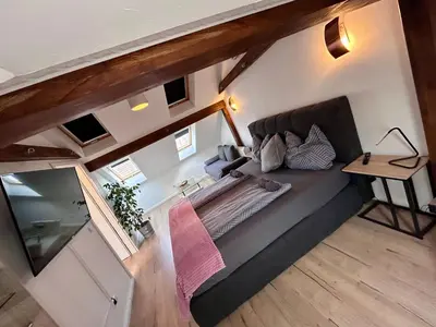 Ein Bett oder Betten in einem Zimmer der Unterkunft Sonnige Dachgeschoss-Oase!