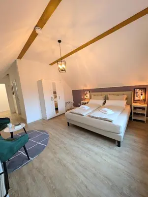 Ein Bett oder Betten in einem Zimmer der Unterkunft 3 Bedroom-Apartment with 1,5 Bathrooms