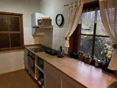 Küche/Küchenzeile in der Unterkunft Ferienhaus Feldblick mit Kamin für 15 Personen