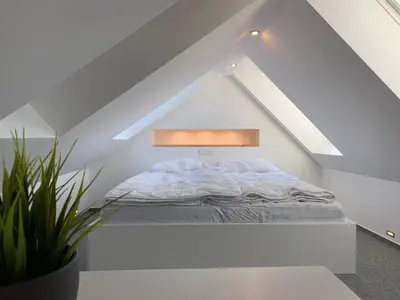 Ein Bett oder Betten in einem Zimmer der Unterkunft Moderne Ferienwohnung in Berlin Lichtenrade