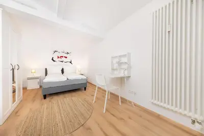 Ein Bett oder Betten in einem Zimmer der Unterkunft Terrassen-Wohnung am Görlitzer Park in Kreuzberg