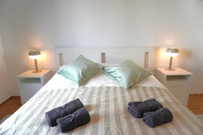 Ein Bett oder Betten in einem Zimmer der Unterkunft Privates Apartment in Westberlin - Jomi Stays