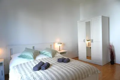 Ein Bett oder Betten in einem Zimmer der Unterkunft Privates Apartment in Westberlin - Jomi Stays