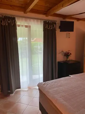 Ein Bett oder Betten in einem Zimmer der Unterkunft Ferienhaus am Feld nahe Berlin