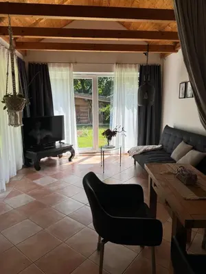 Ein Sitzbereich in der Unterkunft Ferienhaus am Feld nahe Berlin